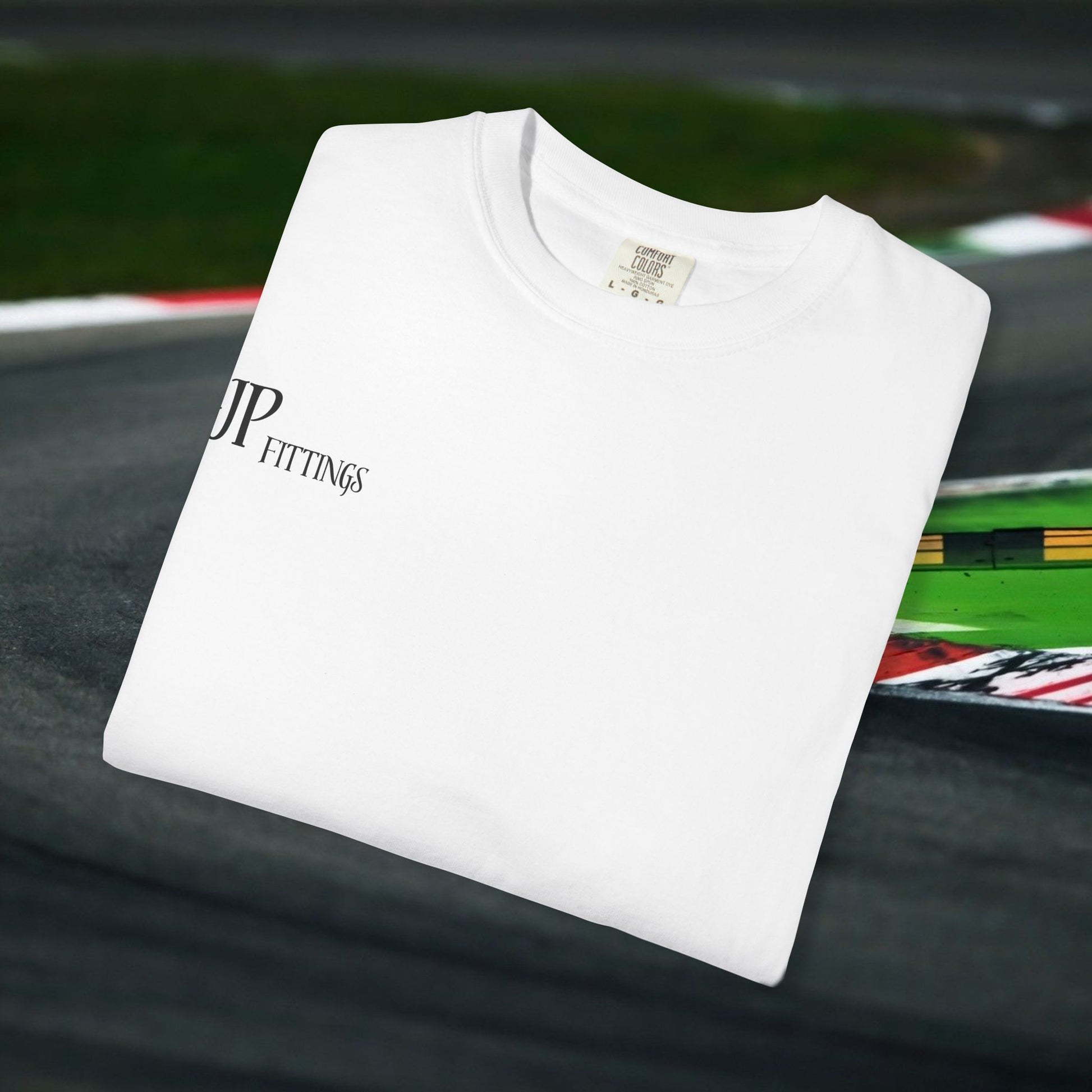 Back view of white Formula 1 racing T-shirt with graphic design and logo